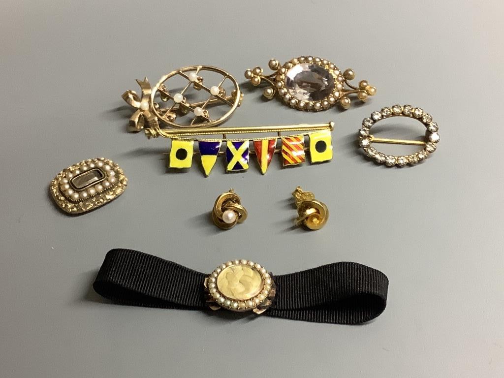 Seven items of assorted jewellery including a 15ct, rock crystal and seed pearl set brooch, 37mm, gross 5.2 grams, a 14ct & enamel semaphore brooch, gross 6.4 grams, a mourning brooch and bracelet and a 9ct gold and gem
